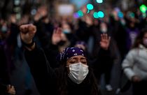 A woman takes part in a demonstration, on International Women's Day in Madrid, Spain, Monday, March 8, 2021.