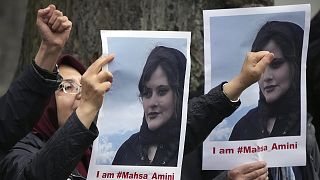 Exiled Iranians gather in protest in front of the Iranian embassy in Berlin, 20 September 2022