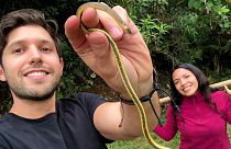 Scientists Alejandro Arteaga and Amanda Quezada with one of the newly named snakes.