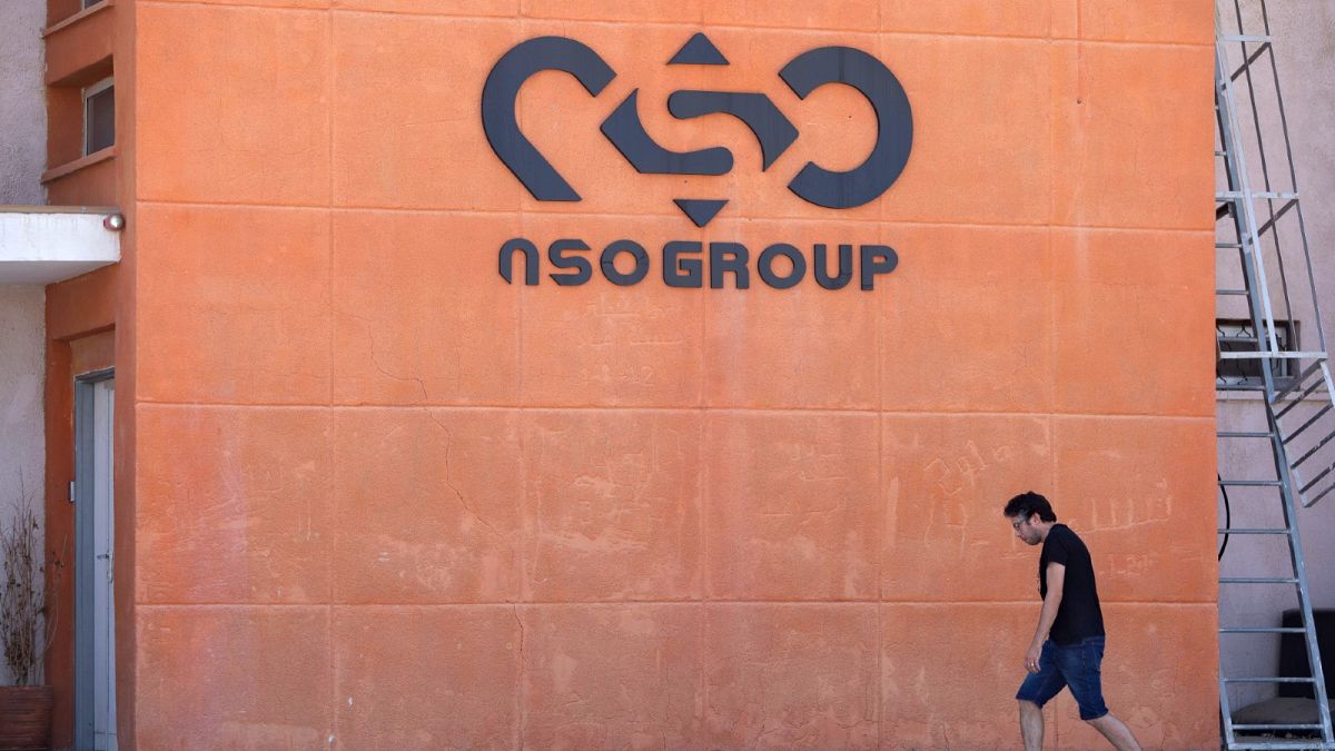 A logo adorns a wall on a branch of the Israeli NSO Group company, near the southern Israeli town of Sapir, Aug. 24, 2021. 