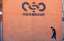 A logo adorns a wall on a branch of the Israeli NSO Group company, near the southern Israeli town of Sapir, Aug. 24, 2021. 