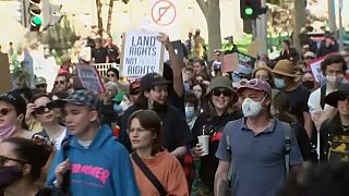 People at an anti-monarchy rally in Melbourne, Australia. 