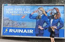 The billboards call out the role of advertising in pushing up emissions.