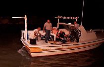Rescuers search for victims and survivors off the coast of Syria's southern port city of Tartus.