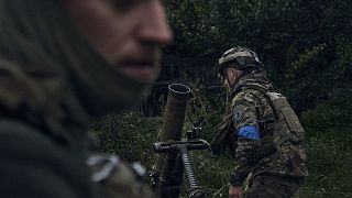 Ukrainian soldiers fire in the recently retaken city of Kupiansk, in the Kharkiv region, Ukraine, Friday, 23 September 2022.