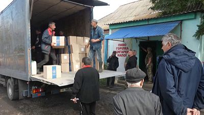 توزيع مساعدات غذائية لسكان مدينة ليبيازي الاوكرانية 22/12/2022