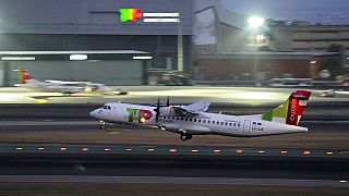 A TAP Air Portugal ATR 72-600 takes off from Lisbon airport.