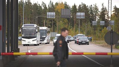 Buses and cars queue to cross the border from Russia to Finland at the Vaalimaa border check point in Virolahti, Finland, Friday Sept. 23, 2022.