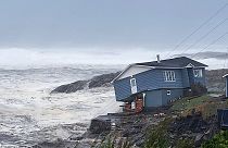 A home fights against high winds caused by post Tropical Storm Fiona in Port aux Basques, Newfoundland and Labrador
