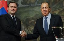 Russian Foreign Minister Sergey Lavrov and Serbian Foreign Minister Nikola Selakovic shake hands after a joint news conference following their talks in Moscow in April 2021