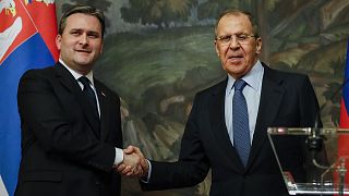 Russian Foreign Minister Sergey Lavrov and Serbian Foreign Minister Nikola Selakovic shake hands after a joint news conference following their talks in Moscow in April 2021