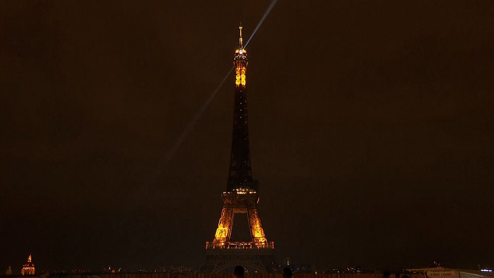 VIDEO Watch lights on the Eiffel Tower switch off as France fears