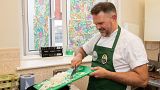 Kenny Tutt cooking at FoodCyle