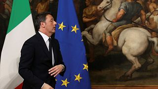 Outgoing Italian Prime Minister Matteo Renzi leaves the bell ceremony signifying the start of the first cabinet meeting of new PM Paolo Gentiloni in 2016