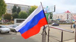 Bandera Rusa ondeando en los territorios ocupados de Ucrania tras los pseudoreferéndums