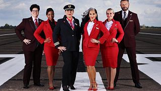 Crew members join TV personality, Michelle Visage, to showcase Virgin Atlantic’s gender identity uniform policy and pronoun badges, rolled out across the airline on Wednesday.