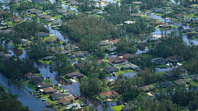 Des maisons sont entourées par les eaux de crue causées par l'ouragan Ian, jeudi 29 septembre 2022, à Fort Myers, Fla.