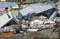 Damaged boats and structures are seen in the aftermath of Hurricane Ian, Thursday, Sept. 29, 2022, in Fort Myers Beach, Fla.