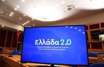 Οθόνη με το σήμα του «Ελλάδα 2.0», πριν από τη συνέντευξη Τύπου για την πορεία υλοποίησης του Εθνικού Σχεδίου Ανάκαμψης και Ανθεκτικότητας «Ελλάδα 2.0»
