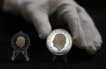 Monedas con el rostro del Rey Carlos III. 