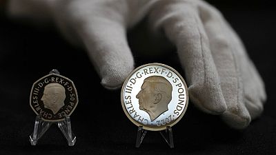 Новые монеты в портретом Карла III