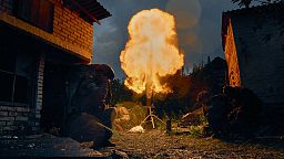 Ukrainian soldiers fire a missile. 