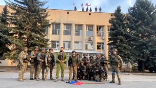 Des soldats ukrainiens célébrant la reconquête de Lyman, le 2 octobre 2022