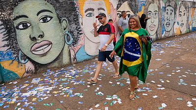 Voters arrive to a polling station during general elections in Brasilia, Brazil, Sunday, Oct. 2, 2022. 