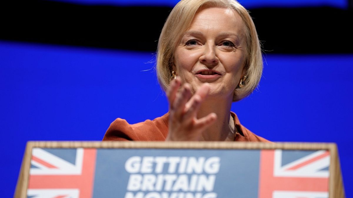 Britain's Prime Minister Liz Truss makes a speech at the Conservative Party conference at the ICC in Birmingham, England, Wednesday, Oct. 5, 2022.