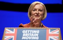 Britain's Prime Minister Liz Truss makes a speech at the Conservative Party conference at the ICC in Birmingham, England, Wednesday, Oct. 5, 2022.