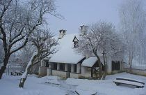 The main house in winter covered with snow. 