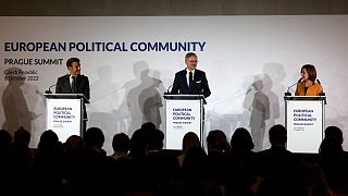 French President Emmanuel Macron (L), Czech Prime Minister Petr Fiala (C) and Moldovan President Maia Sandu at a news conference at the European Summit in Prague, Oct. 6, 2022