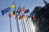 The Ukrainian flag floats outside the European Parliament before a commission on Russia's escalation of its war of aggression against Ukraine