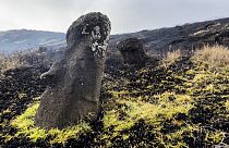 Image released by the Rapanui Municipality shows Moai stone statues affected by a fire on Easter Island