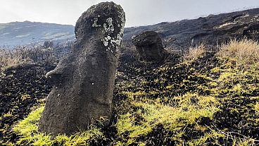 Image released by the Rapanui Municipality shows Moai stone statues affected by a fire on Easter Island