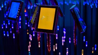 The logo of the Ukrainian organization Center for Civil Liberties is displayed next to previous years winners' pictures at the Nobel Institute in Oslo, 7 October, 2022.