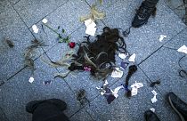 Strands of hair lie on the ground after being cut by several women during a protest against the death of Iranian Mahsa Amini, in Istanbul, Turkey, Sunday, Oct. 2, 2022. 