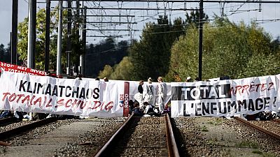 Climate change activists block two TotalEnergies sites in Belgium