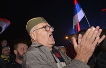 Участник акции протеста против фальсификаций на выборах в Республике Сербской