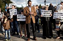 a large group of immigrants living in Denmark welcome migrants at Rodby September 8, 2015