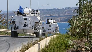 Des véhicules de la Force de maintien de la paix des Nations Unies patrouillent dans la zone côtière de Naqoura (sud du Liban) près de la frontière avec Israël - 11.10.2022