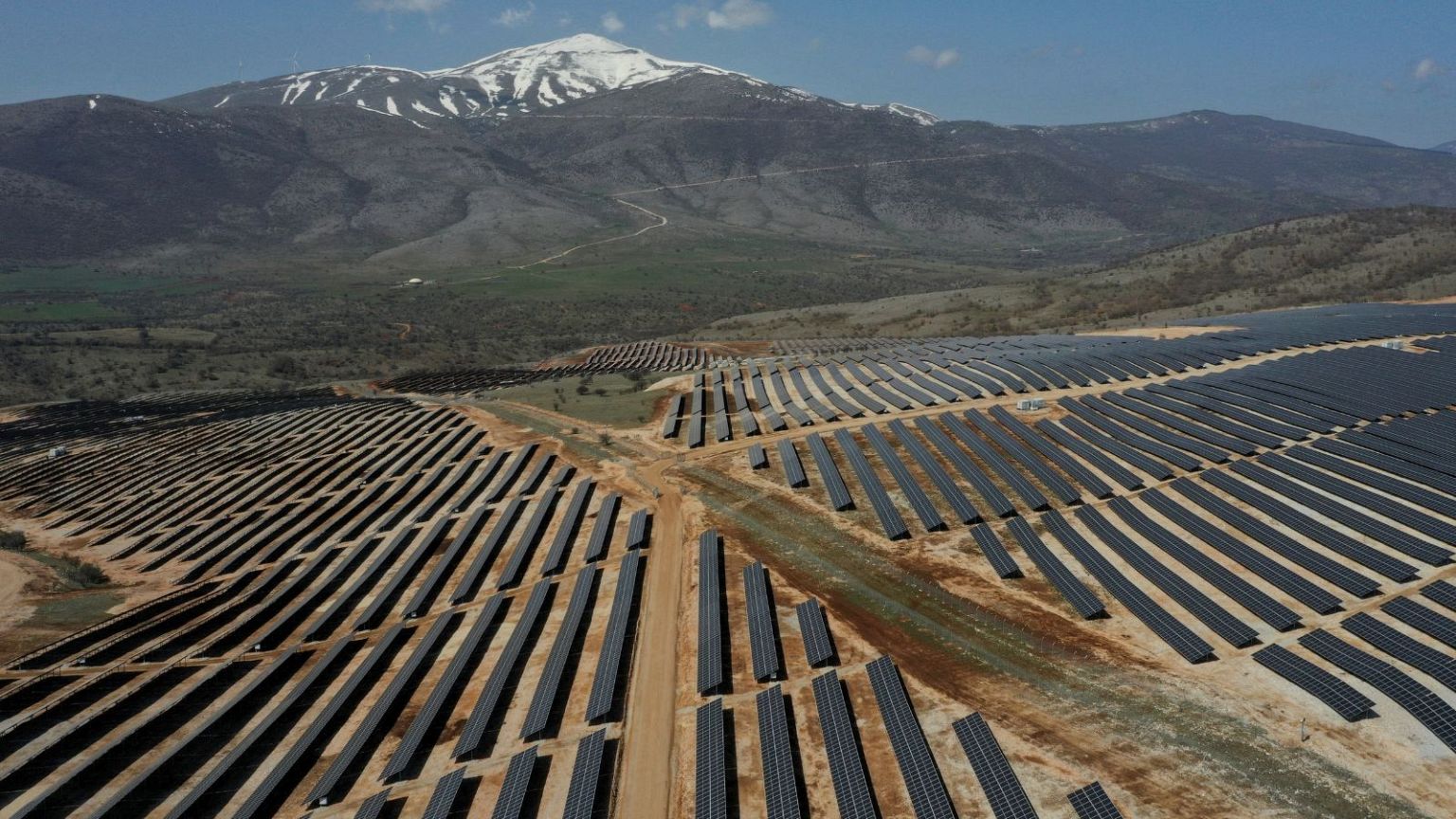 Solar panels soak up the sun's rays at a new photovoltaic park near Kozani, Greece, pictured in August this year.