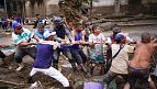 Rescue workers search for Venezuela landslide survivors