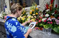 A woman visits a memorial site for the victims to mark the 20th anniversary of the Bali bombings.
