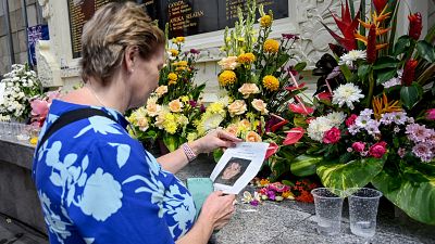 A woman visits a memorial site for the victims to mark the 20th anniversary of the Bali bombings.