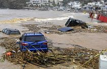 Cars submerged in water, following heavy thunderstorms, in the village of Agia Pelagia, on the island of Crete, 15 October 2022