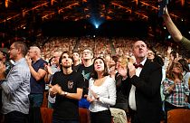 Halle Tony Garnier applauds as the Lumiere festival gets under way