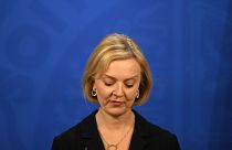 Britain's Prime Minister Liz Truss holds a press conference in the Downing Street Briefing Room in central London, Friday Oct. 14, 2022.