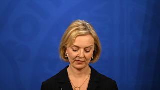 Britain's Prime Minister Liz Truss holds a press conference in the Downing Street Briefing Room in central London, Friday Oct. 14, 2022. 