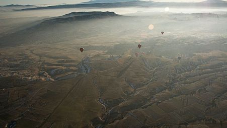 Cappadocia is a popular tourist destination in Turkey renowned for unusual rock formations and rock-caved churches.